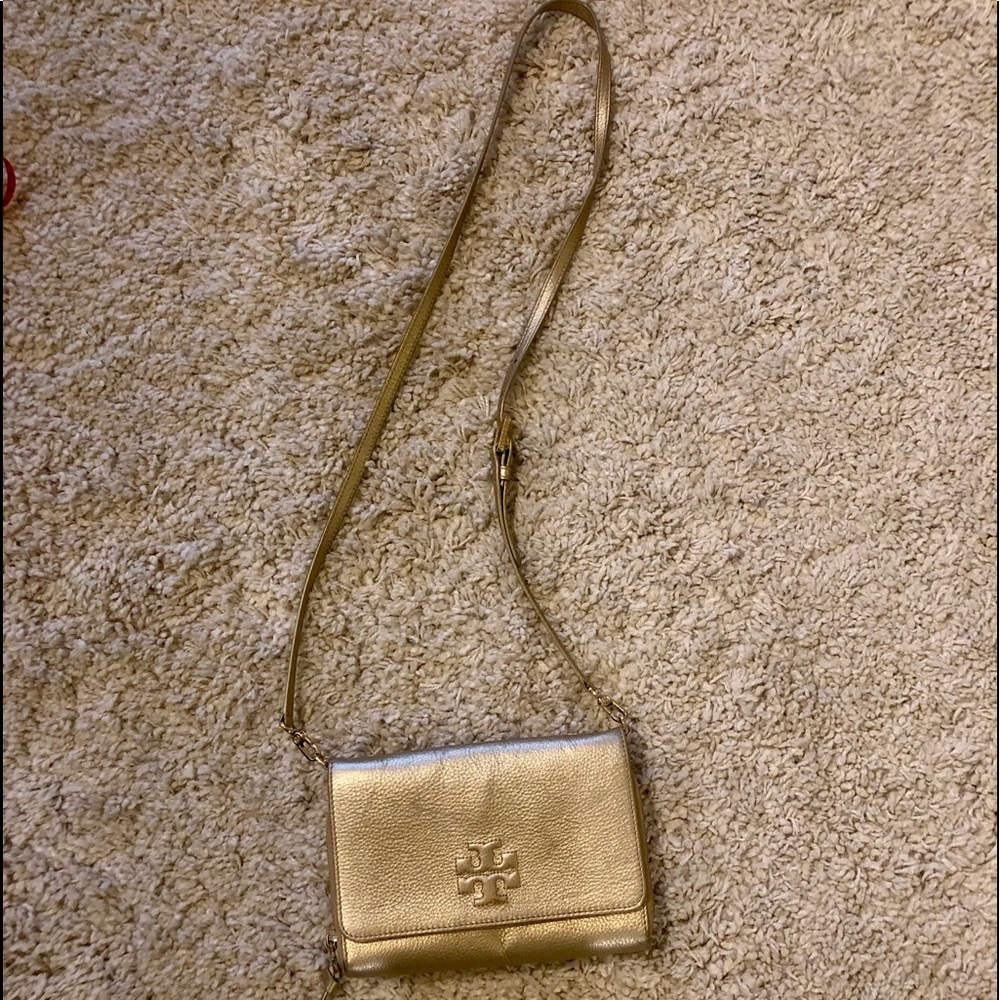 Gold Tory Burch crossbody purse